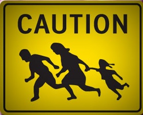 caution sign illegals in roadway