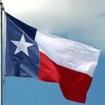texas flag waving in the wind
