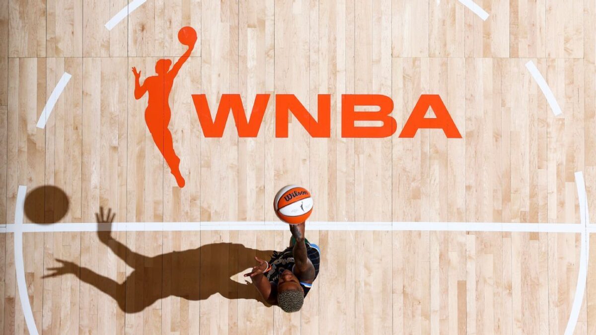 wnba logo with player shooting